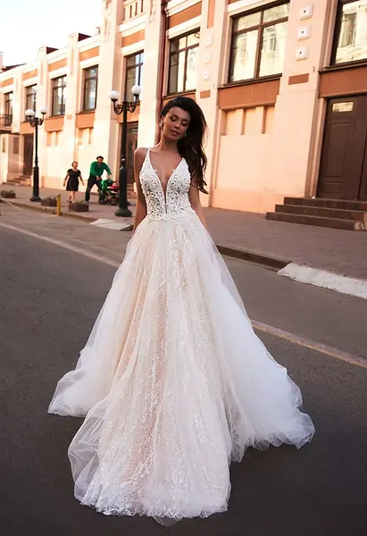 Bride in an off-the-rack lace bodice wedding gown.
