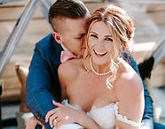 Bride and groom sharing a kiss on their wedding day