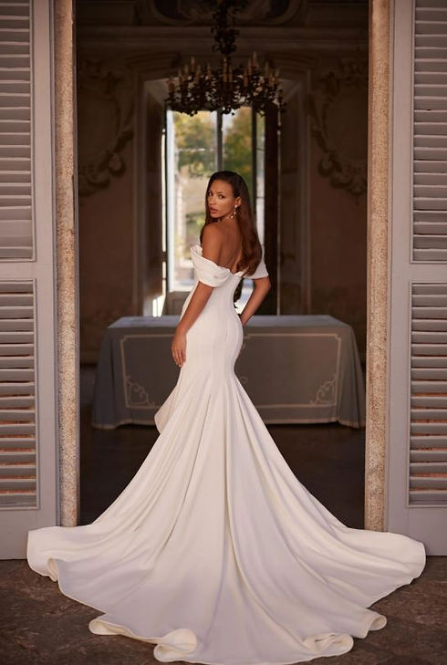 simple wedding dress by mila maya couture at milena's bridal in dallas