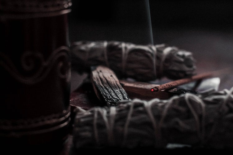 Sage Palo Santo and Incense burning