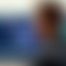 An Executive sitting in front of a computer screen.