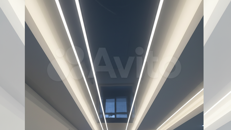 Close-up view of a glossy stretch ceiling with integrated LED lighting