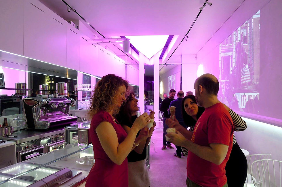Close-up view of geometric 3D ceiling tiles in a commercial space