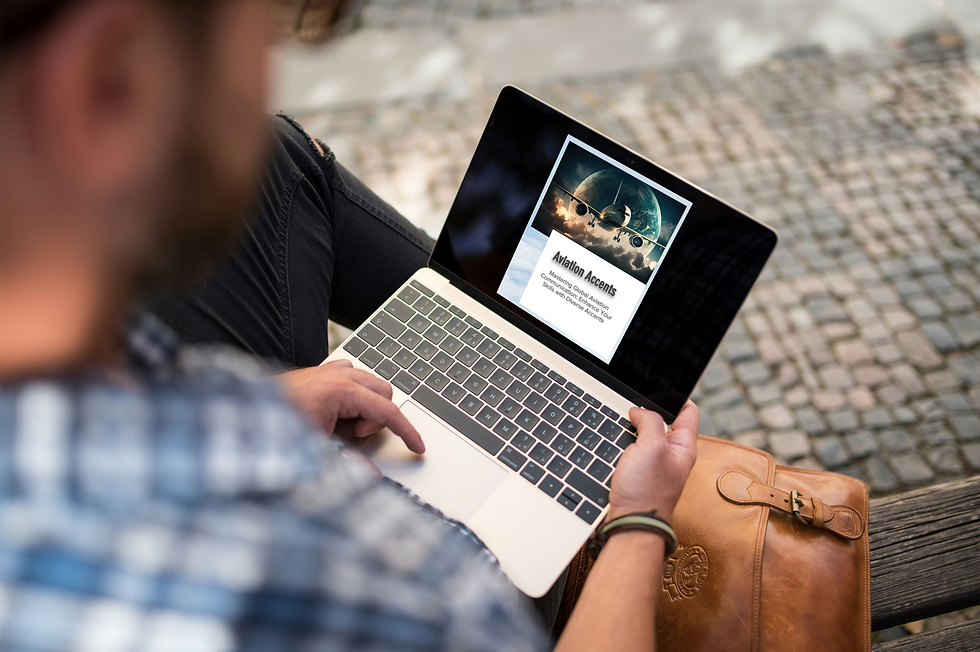 A person sitting outdoors on a bench, using a laptop that displays a webpage titled "Aviation Accents" with an image of an airplane flying against a backdrop of the Earth and clouds. A brown leather bag rests beside them.