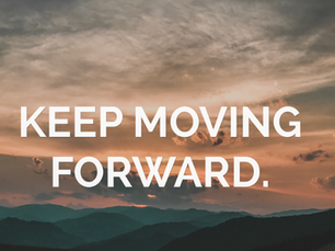 picture of a sunset with text "keep moving forward" across the center