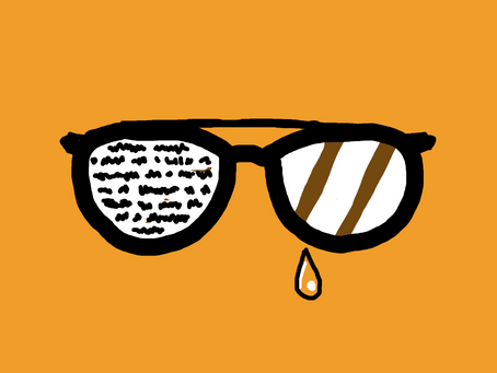 Glasses that reflect unreadable words, and a single tear falling.