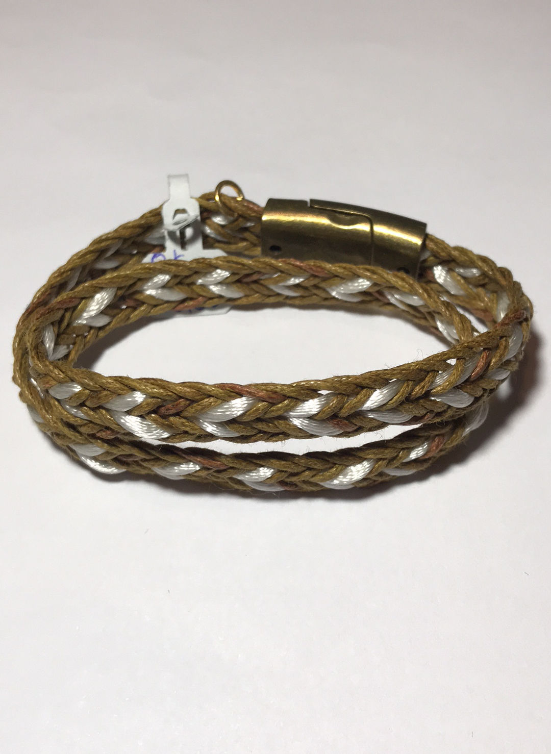 Pulseira de couro trançado marrom e branco 