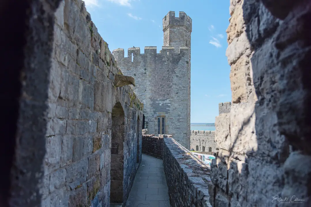 Caernarfon Castle walkway, Wales. Van life. Van life UK. Solo van life. Travel blog. Travel blogger. Castles of Wales. UK Castles.
