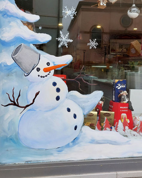 bonhomme de neige peinture sur la vitrine, peinture artistique en alsace, artiste en alsace