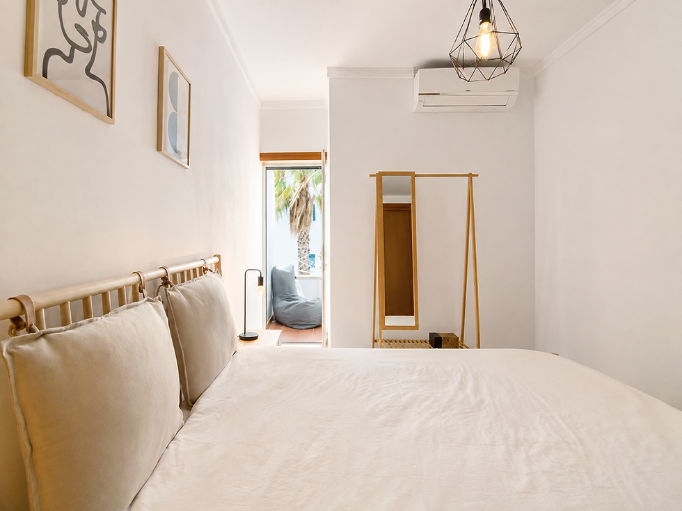 quarto do apartamento de férias ae flat falésia na praia da falésia