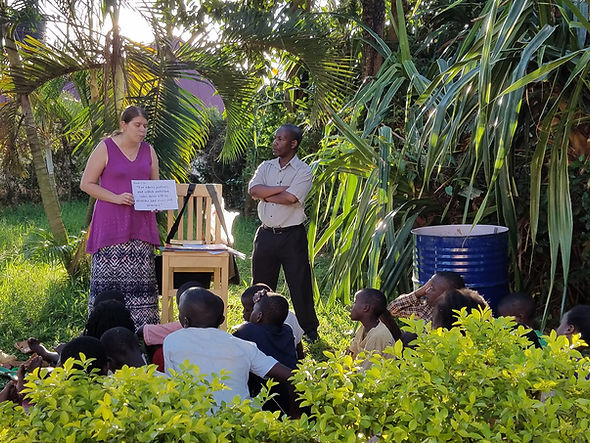 me, child, staff, Good News Club, my house, teaching, group, landscape, left, Uganda.jpg