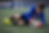 Close-up view of goalkeeper diving to save a ball during training