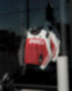 Red and white Ducati jacket in a photography portfolio.