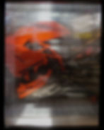 Abstract photography portfolio shot of red shapes through glass