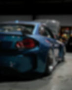 Blue modified sports car in a photography portfolio.