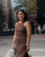 Smiling woman in brown dress for a photography portfolio