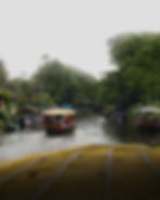 Small boats on a river in a photography portfolio.