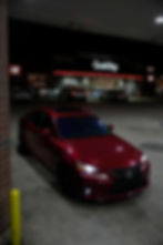 Red Lexus parked at a QuikTrip for a photography portfolio