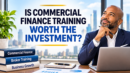 Business professional reviewing commercial finance training options at an office desk