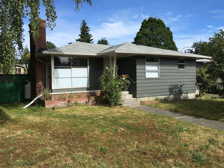 Newly painted gray residential home