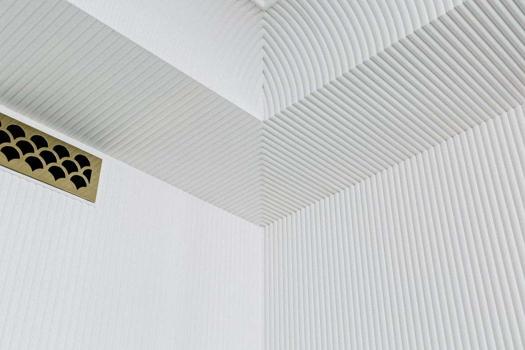 Limewash over Fluted Plaster Walls and Coves