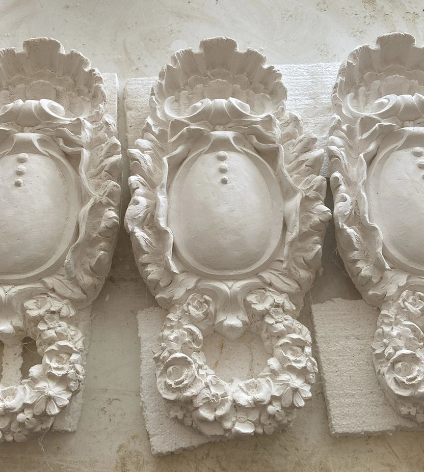 Cast Plaster Cartouches in Studio