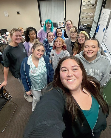 Michigan College of Beaty-Monroe students posing for picture