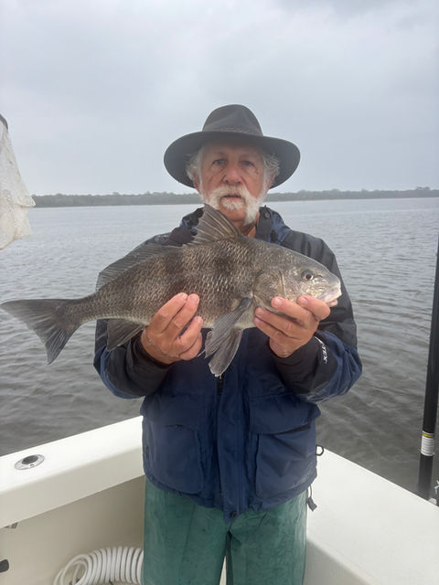 angler posing with his catch