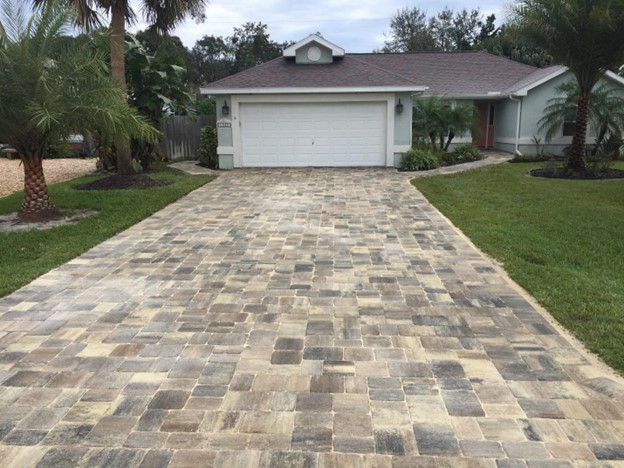 home with new paver driveway