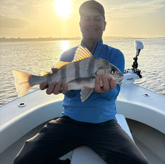 angler posing with his catch