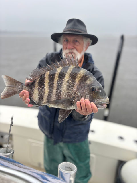 angler posing with his catch