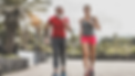 middle-aged couple exercising together outdoors