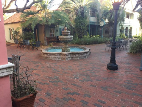 brick courtyard with center fountain