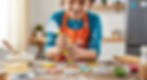 child decorating star-shaped cookies