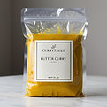 elegant and simple professionally vacuumed sealed transparent bag of butter curry. Add bra