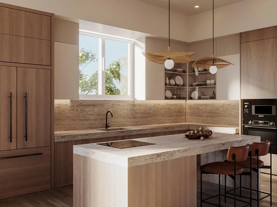 Modern kitchen with sleek cabinetry, quartz countertops, stainless steel appliances, and a large center island under elegant pendant lighting