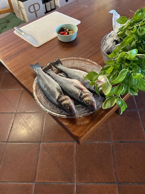 I learned how to filet a fish, Pete worked on gnocci. We both "pestled" the basil pesto at the Cinque Terre Cooking School