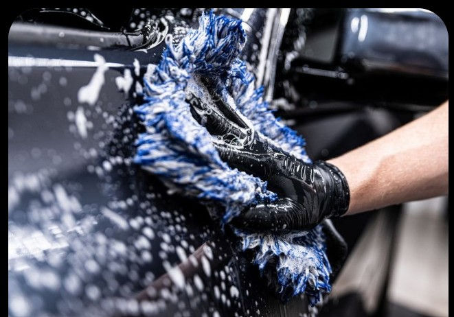 Exterior car detailing with foam wash removing dirt and grime in Christiansburg VA by Driven Detail Studio