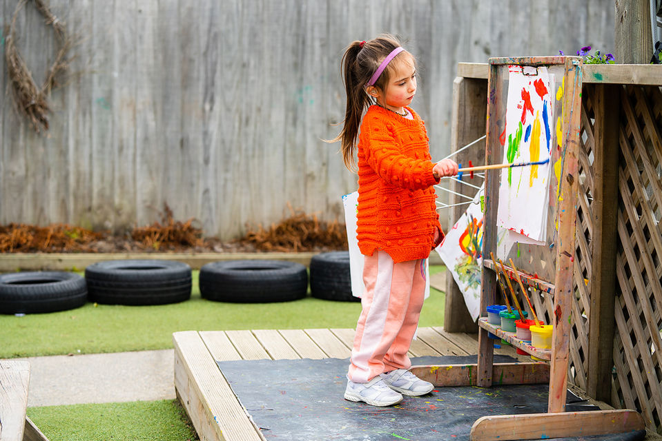Girl Painting at Cobham Street Spreydon Kindergarten