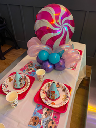 purple tiffany blue and pink balloon centerpiece with candy swirl topper for LOL Surprise OMG themed 6th birthday at Catch Air Hasbrouck Heights NJ