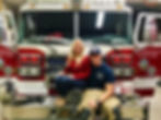 Stephen Ceausu and Jordan Lane Ceausu picture on the fire truck