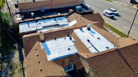 commercial flat roof with elastomeric roof coating 