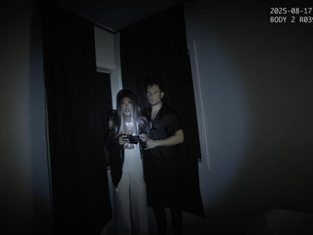 Scarecrow lurking behind a suburban hedge in found footage horror film Strawstalker