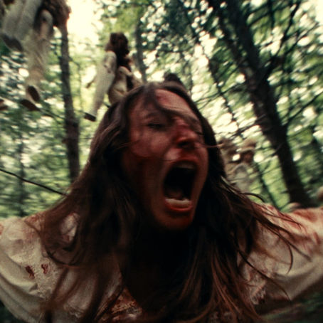Fabianne Therese faces terror from masked killer Dolly in Rod Blackhurst’s grindhouse horror at Fantastic Fest 2025.