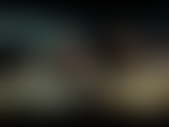 Business professionals in a desert setting look tense and alarmed.