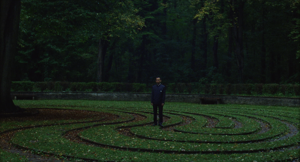 Still from A Soil A Culture A River A People: Zezhi Long as Citizen Yu, caught between simulation and cultural memory.