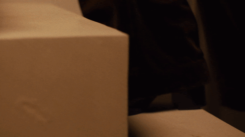 Still from Opus, featuring a journalist navigating a mysterious celebrity retreat.
