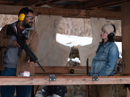 Lena Headey in Ballistic portraying a grieving factory worker in a gritty thriller setting.