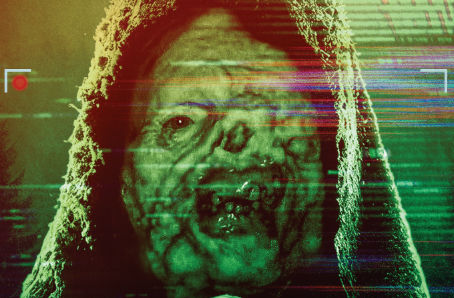  A terrified documentary crew filming inside a dark rural farmhouse as a shadowy figure looms behind them.