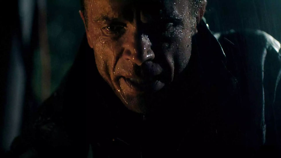 David Chokachi appears in a tense outdoor survival scene from Married Alive.